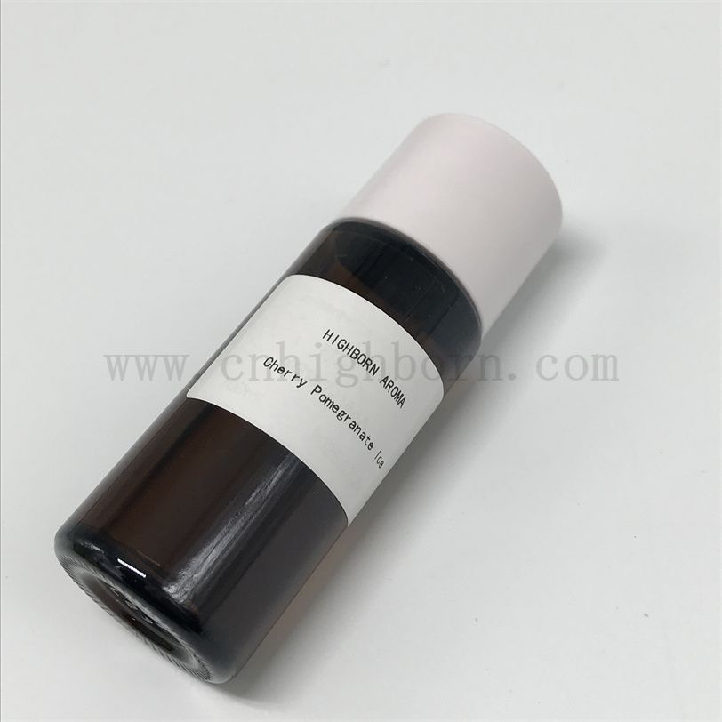 Scenwany wiśniowy granat z owoców. Esencja olej