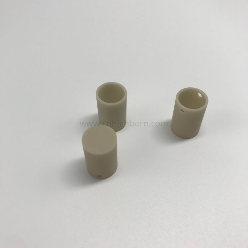 Cylindryczny tygiel ceramiczny o wysokiej przewodności cieplnej z azotku glinu (AlN).