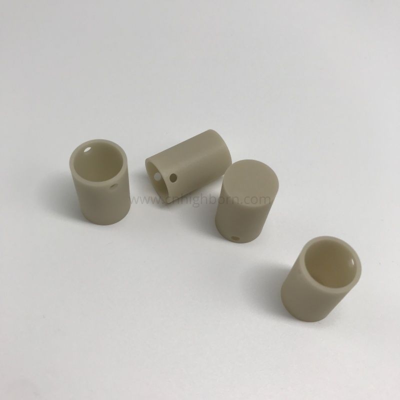 Cylindryczny tygiel ceramiczny o wysokiej przewodności cieplnej z azotku glinu (AlN).